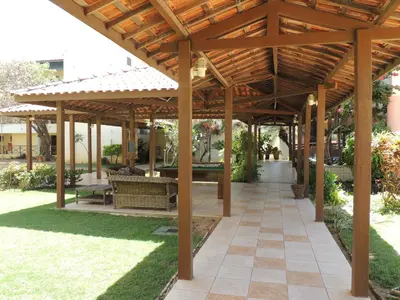 Um jardim no exterior de Ap Luxo 208 e 207 Prox Beach Park