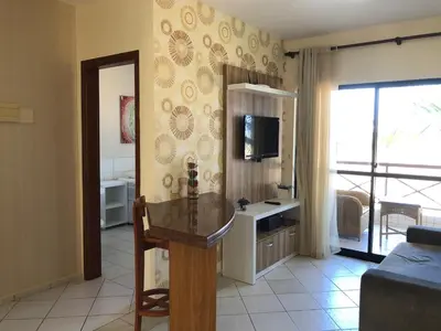 Uma televisão e/ou sistema de entretenimento em Ap Luxo 208 e 207 Prox Beach Park