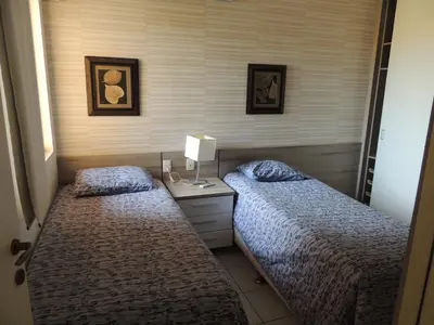 Uma cama ou camas num quarto em Ap Luxo 208 e 207 Prox Beach Park