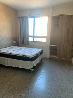 Uma cama ou camas num quarto em Tabajara Residence Service