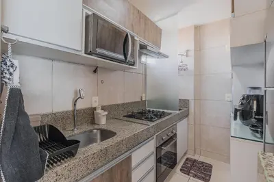 A cozinha ou kitchenette de BeachVillage 1507N - Praia do Futuro por Carpediem