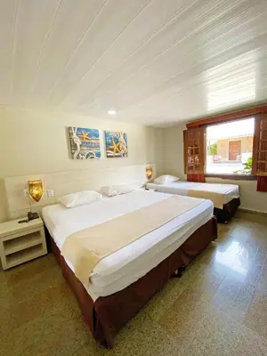 Uma cama ou camas num quarto em Hotel Parque das Fontes