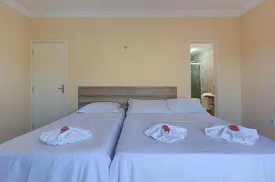Uma cama ou camas num quarto em Casa Incrível na Praia de Tabuba by Carpediem
