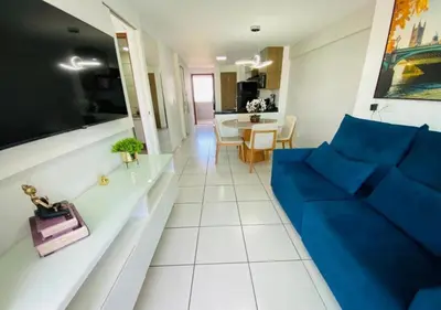 Uma área de estar em Beach Class Fortaleza