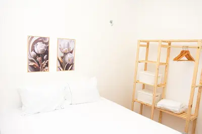 Uma cama ou camas num quarto em Apartamento Aconchegante próximo à Arena Castelão