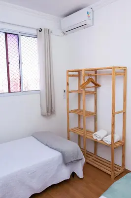Uma cama ou camas num quarto em Apartamento Aconchegante próximo à Arena Castelão
