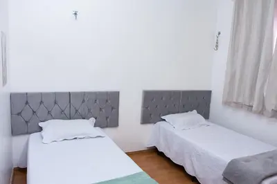 Uma cama ou camas num quarto em Apartamento Aconchegante próximo à Arena Castelão