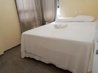 Uma cama ou camas num quarto em Tabajara Flat 807 Com piscina