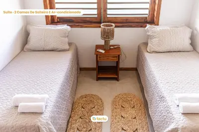 Uma cama ou camas num quarto em Casa Canoé Fortim Piscina de Luxo em Condomínio