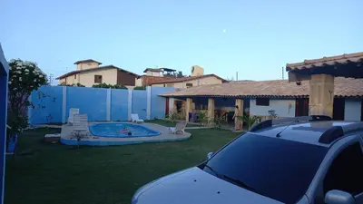 A piscina em ou perto de Casa por temporada na Caponga-Ce
