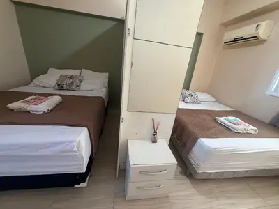 Uma cama ou camas num quarto em BP03- Em Cumbuco Vento na Varanda Estilo Bali Lounge por Will