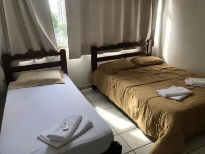 Uma cama ou camas num quarto em Apartamento praia Beira Mar