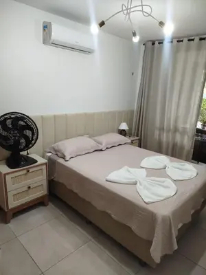 Uma cama ou camas num quarto em Wai Wai Cumbuco Eco Residence