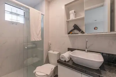 Uma casa de banho em JSmart #304 - Studio em Fortaleza by Carpediem
