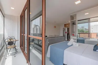 Uma cama ou camas num quarto em JSmart #304 - Studio em Fortaleza by Carpediem