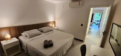 Uma cama ou camas num quarto em Go Eco Paradise Ap210 Pé na Areia e Piscina no Centro do Cumbuco