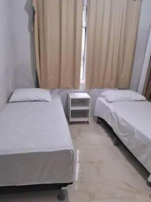 Uma cama ou camas num quarto em Apartamento Praia do Futuro 4 Quartos Morada das Dunas
