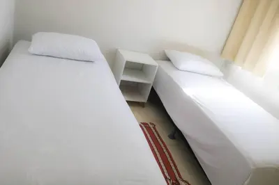 Uma cama ou camas num quarto em Apartamento Praia do Futuro 4 Quartos Morada das Dunas