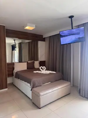 Uma cama ou camas num quarto em VG FUN Praia do Futuro Pé na Areia ap 311 IMOB TEMPORADA