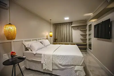 Uma cama ou camas num quarto em Flat Hotel Mercure