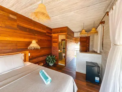Uma cama ou camas num quarto em Pousada Dunnas Moitas