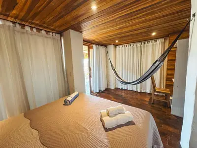 Uma cama ou camas num quarto em Pousada Dunnas Moitas