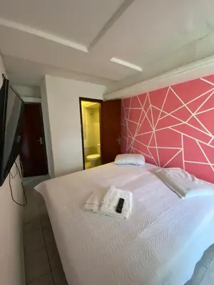 Uma cama ou camas num quarto em pousada longarinas