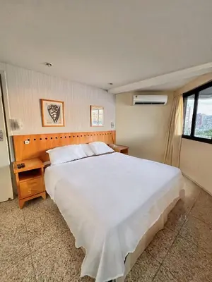 Uma cama ou camas num quarto em Flat Particular em Blue Tree Towers Beira Mar Fortaleza