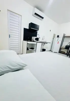 Uma cama ou camas num quarto em Ap no Derby com garagem e ar