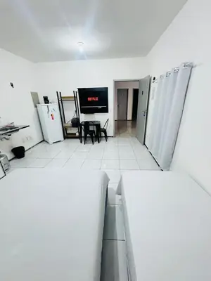 Uma televisão e/ou sistema de entretenimento em Ap no Derby com garagem e ar