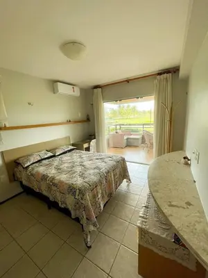 Uma cama ou camas num quarto em Aquaville Resort - Apartamento Térreo