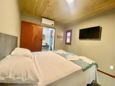 Uma cama ou camas num quarto em Casa do Pier, bangalôs em Fortim c/ Café da Manhã