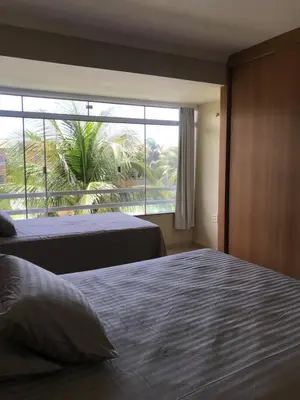 Uma cama ou camas num quarto em Cartier Praia