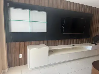 Uma televisão e/ou sistema de entretenimento em Golf Ville Resort