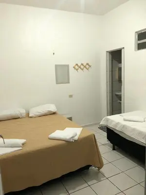 Uma cama ou camas num quarto em Casa Brisa 2
