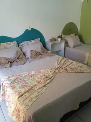 Uma cama ou camas num quarto em Recanto Canoa - Canoa Quebrada
