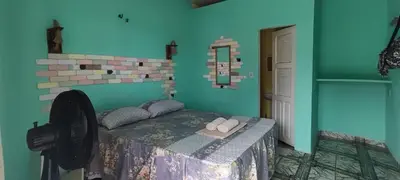 Uma área de estar em Aloha pousada & restaurante