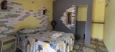 Uma cama ou camas num quarto em Aloha pousada & restaurante