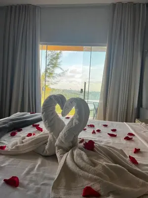 Uma cama ou camas num quarto em Villa brisa icaraizinho suíte premium 1 andar