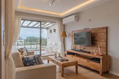 A planta de Beach Place 302 - Apê com varanda by Carpediem