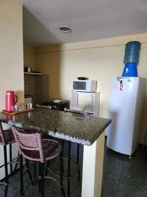 A cozinha ou kitchenette de Apartamento na Praia de Iracema com vista mar
