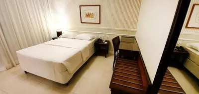 Uma cama ou camas num quarto em Hotel Villa Mayor Charme