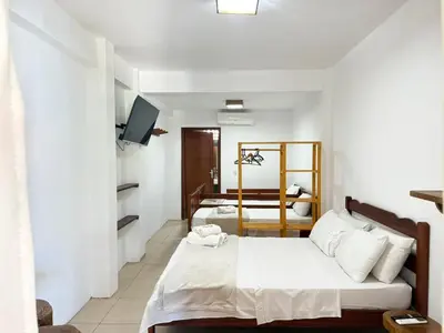 Uma cama ou camas num quarto em Hotel Pousada 360