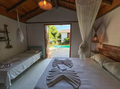Uma cama ou camas num quarto em Villa Atlântic Icaraizinho 700 m da praia