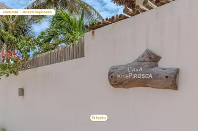 Um certificado, prémio, placa ou documento mostrado em Casa KitePirosca, quartos com vista mar em Fortim