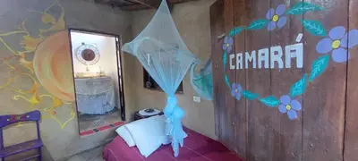 Uma cama ou camas num quarto em Pousada com chalés na serra da Meruoca