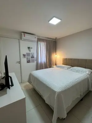 Uma cama ou camas num quarto em Apartamento Paradise Golf Ville
