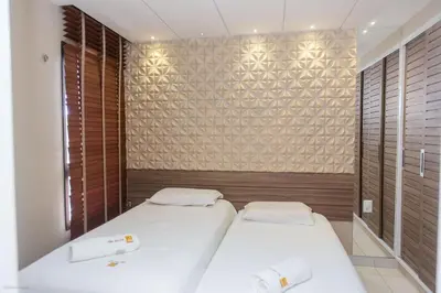 Uma cama ou camas num quarto em Praia do Cumbuco - Apartamento Completo - VG Sun
