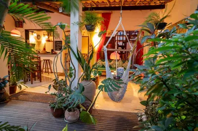 Um jardim no exterior de Pousada Jangada Prea