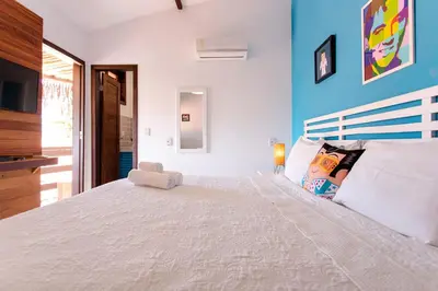 Uma cama ou camas num quarto em Pousada La Vie Jeri